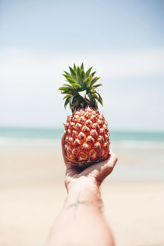 Summer beach background pineapple, warm tone filter