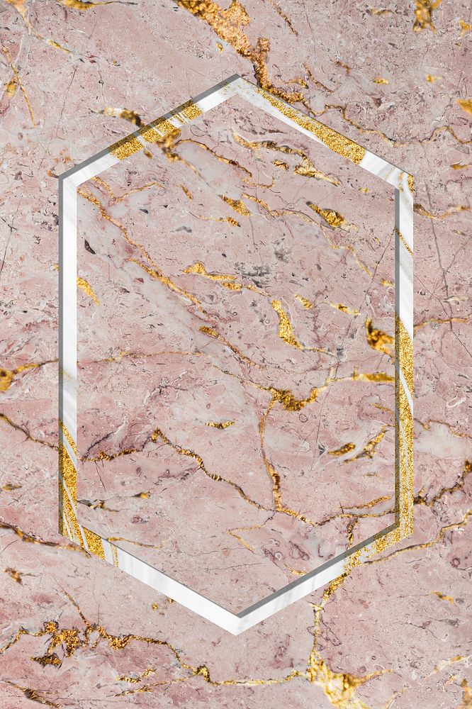 Hexagon frame on pink marble textured background