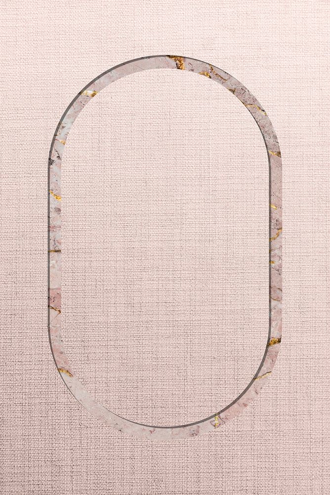 Oval frame on pink fabric textured background