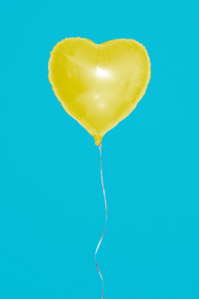 Yellow heart balloon mockup on a blue background 