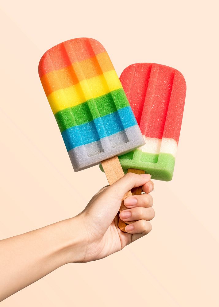 Hand with ice pops in summertime mockup