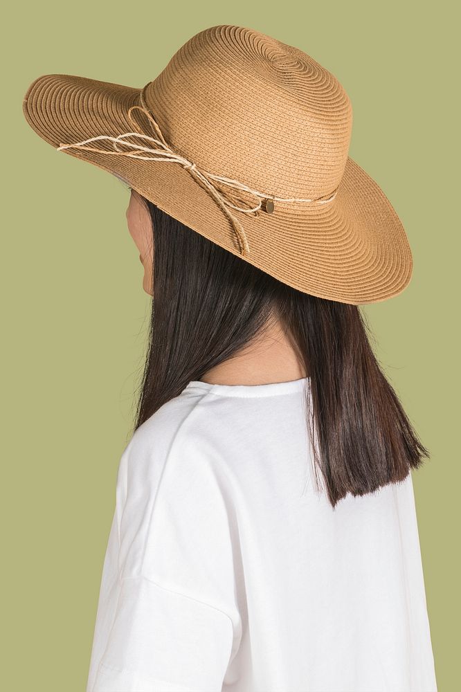 Woman wearing a wide brim beach hat profile portrait