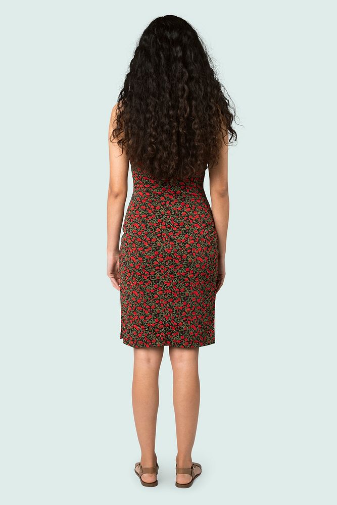 South American woman with long curly hair full body