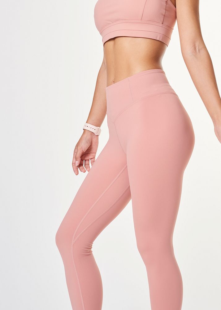 Woman wearing baby pink workout leggings mockup 