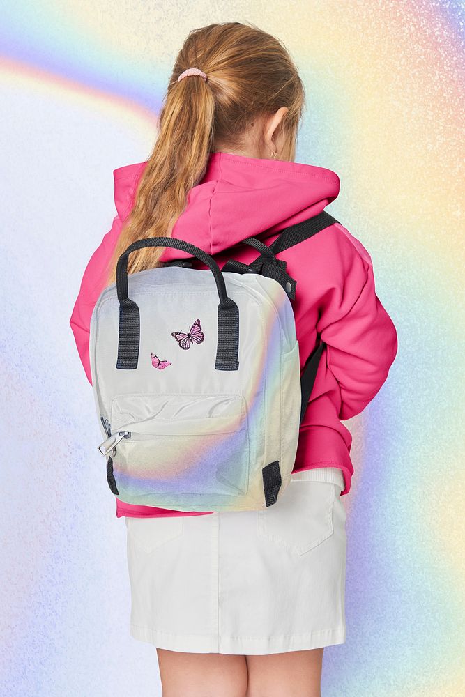 Girl with pastel school bag in studio