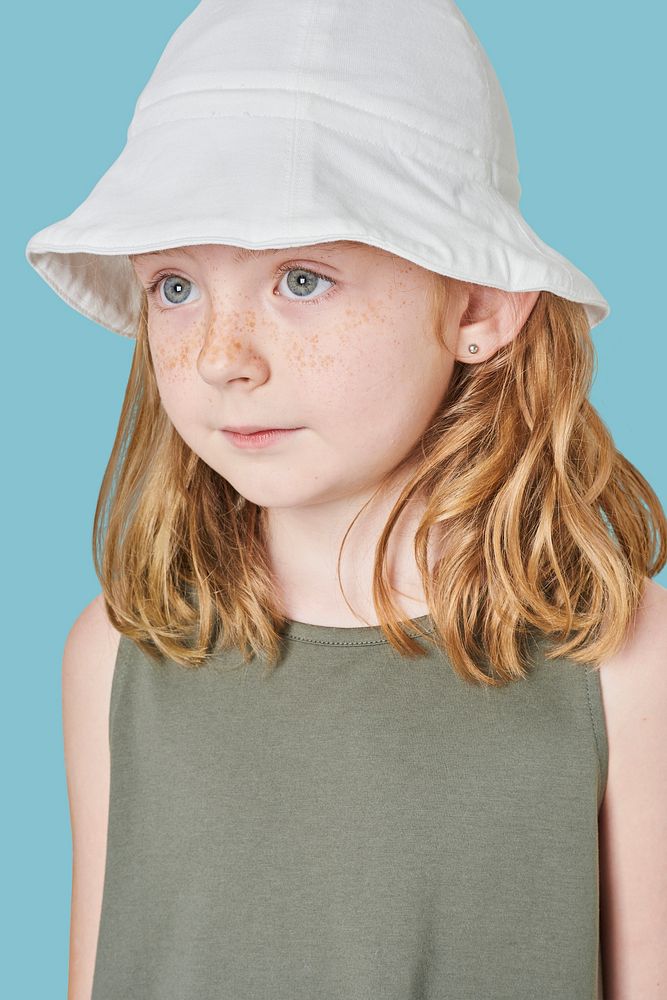 Girl wearing tank top and bucket hat
