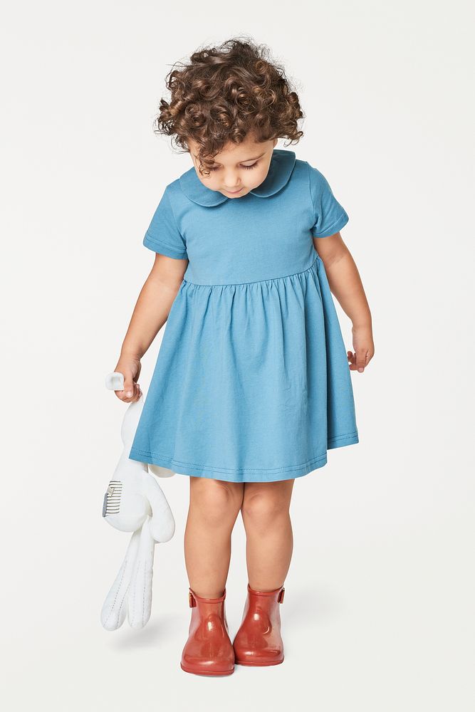 Full body girl wearing purple dress in studio