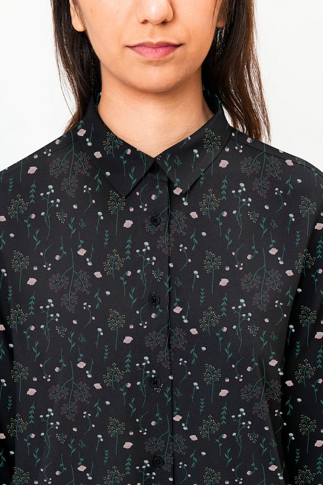 Asian woman wearing shirt with floral design