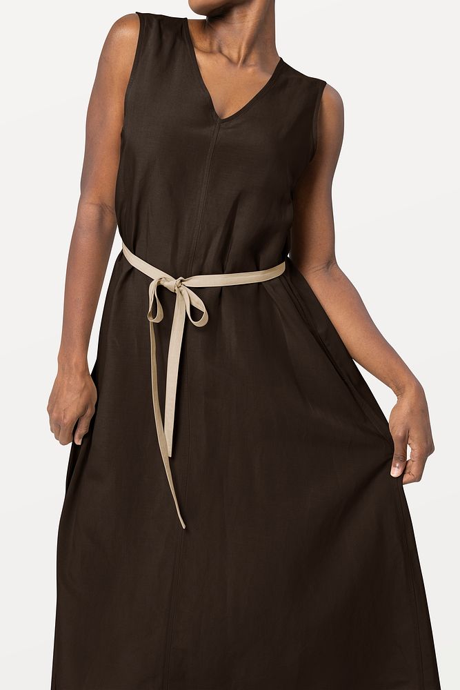 African American woman in belted brown dress women&rsquo;s fashion shoot