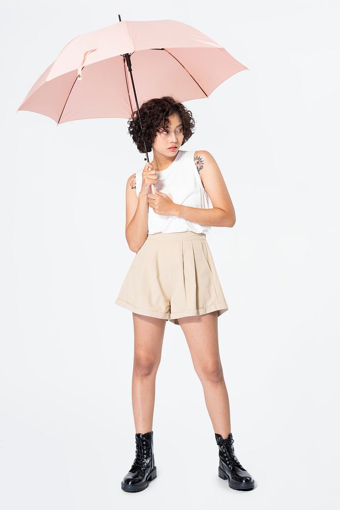 Woman holding umbrella mockup psd casual fashion full body