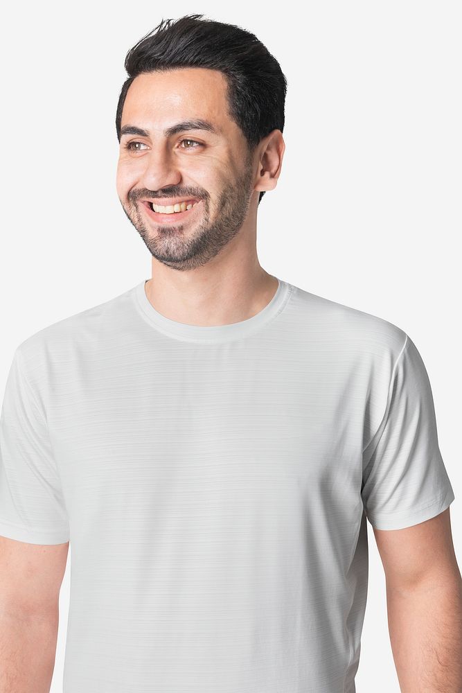 Man in simple white tee studio portrait