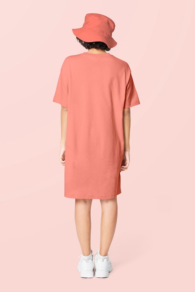 Woman in peach t-shirt dress and bucket hat casual wear apparel