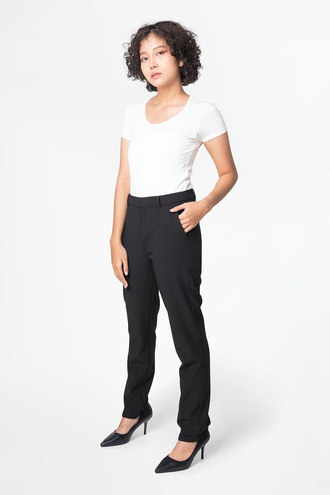 Woman in black slack pants and white tee full body