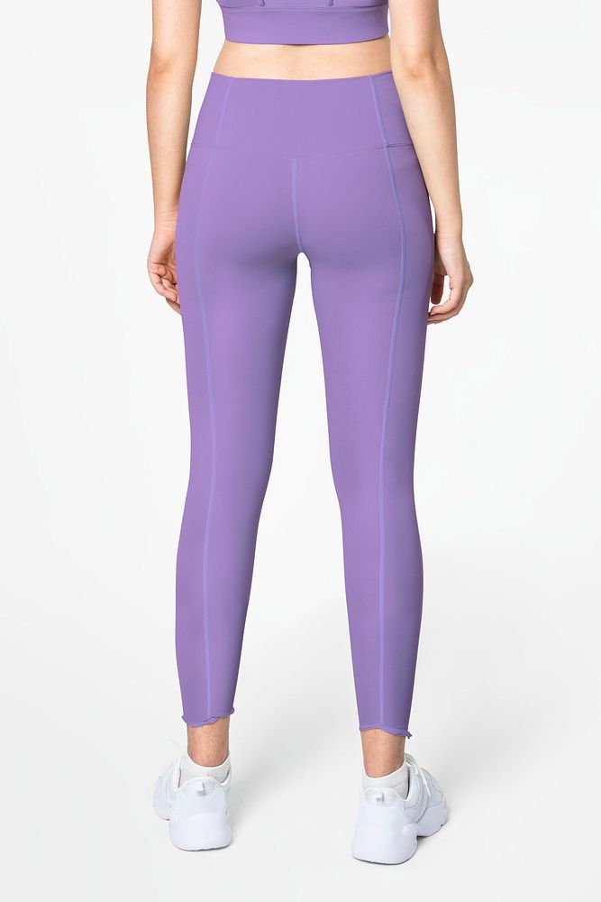 Woman in purple sports bra and leggings activewear apparel full body