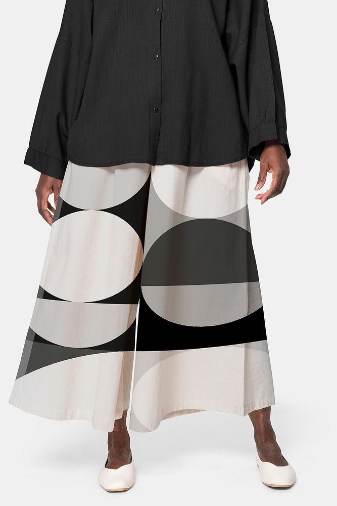 African American woman wearing geometric patterned culotte pants