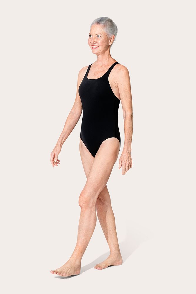 Mature woman in black design one-piece swimsuit summer apparel full body