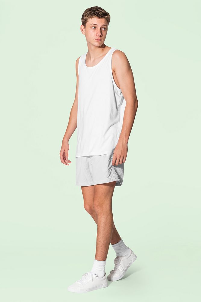Men&rsquo;s white tank top and gray shorts for youth summer apparel shoot with design space