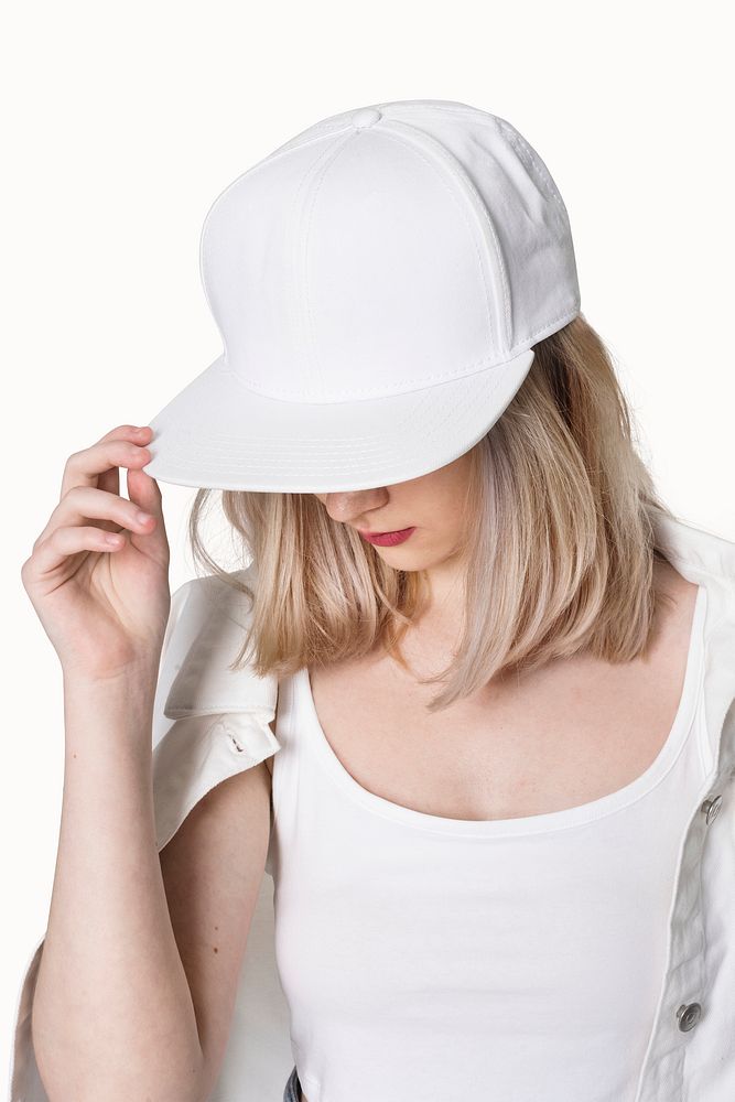 Teenage girl in white snapback cap street fashion shoot