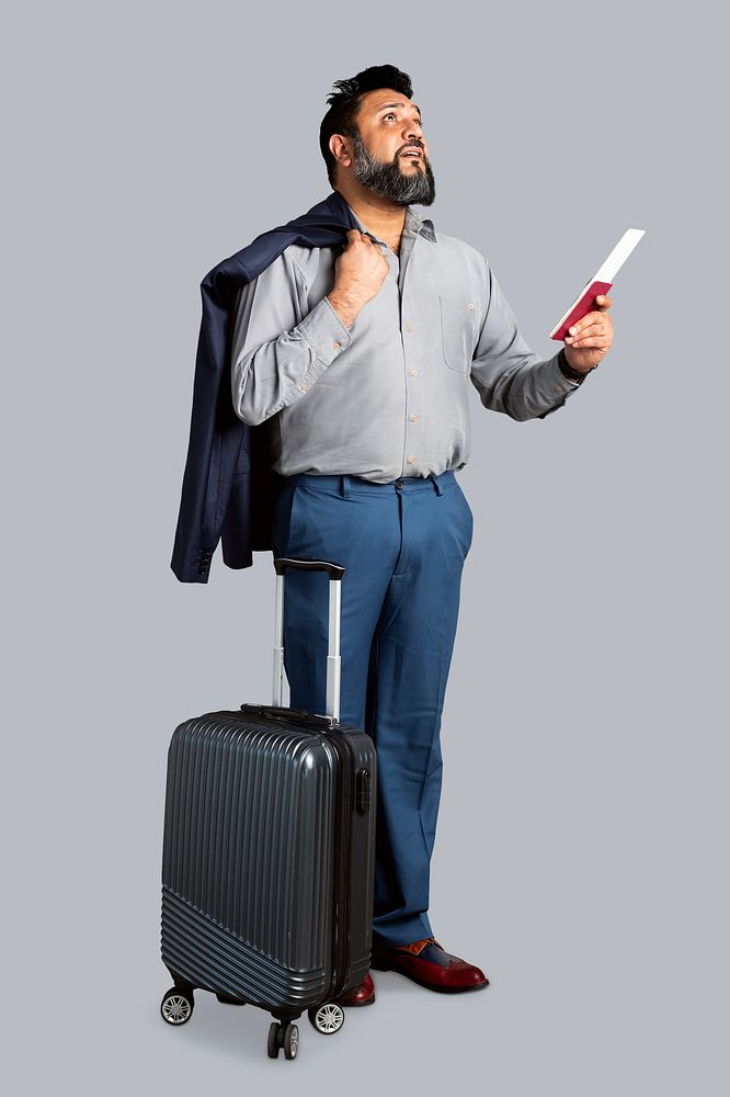 Happy Indian businessman checking the departure board at the airport mockup 