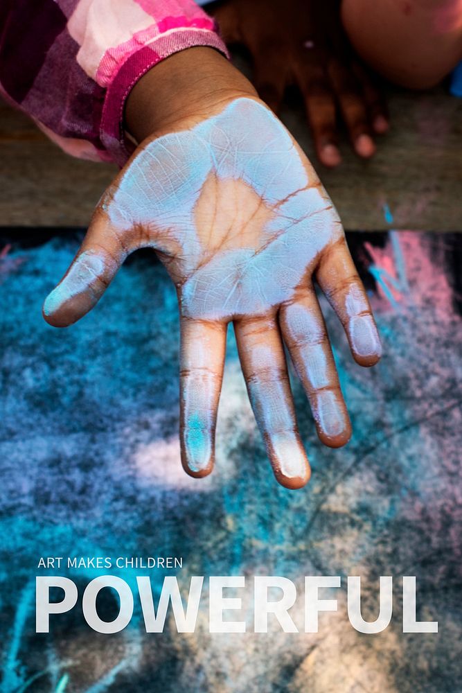 Blue chalk paint on kid hand with art makes children powerful text