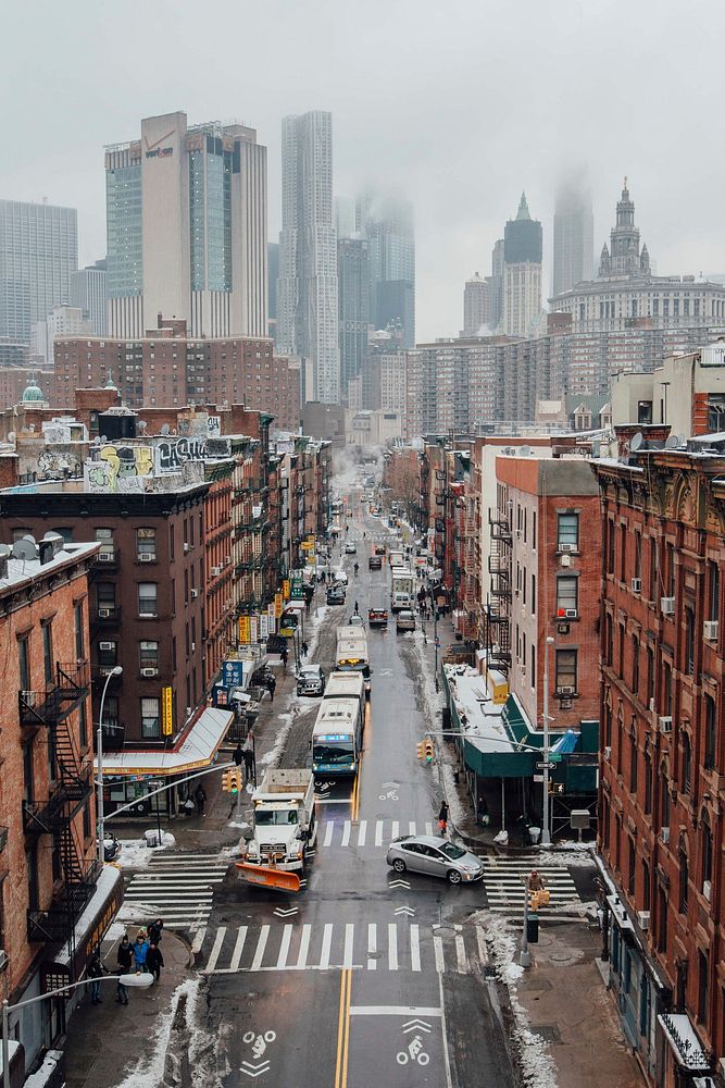 Aerial view of morning traffic and skyscrapers in on foggy New York day. Original public domain image from Wikimedia Commons