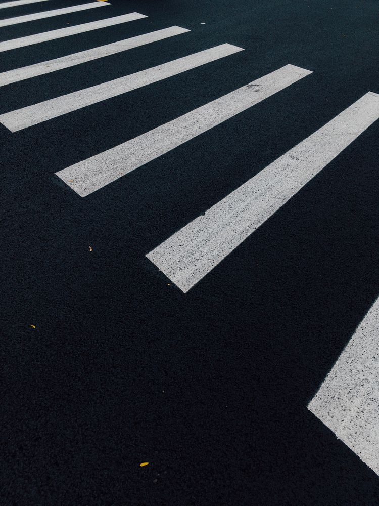 A black and white crosswalk in the street. Original public domain image from Wikimedia Commons