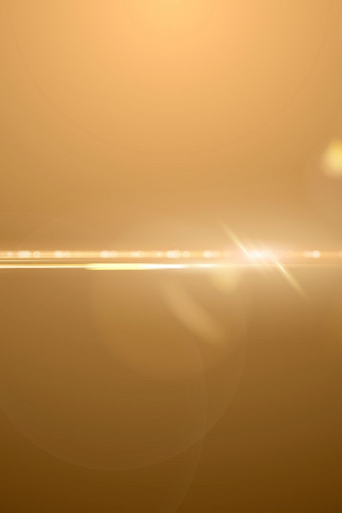 Bright gold anamorphic lens flare background