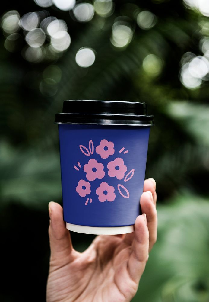 Coffee cup mockup, pink floral design psd