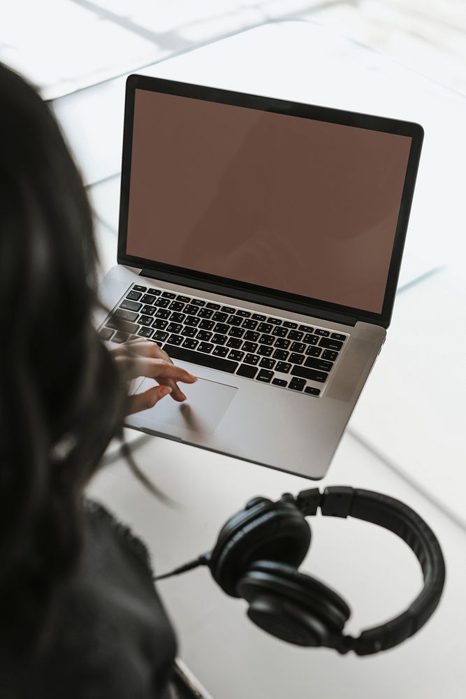 Woman working from home on her laptop during covid-19