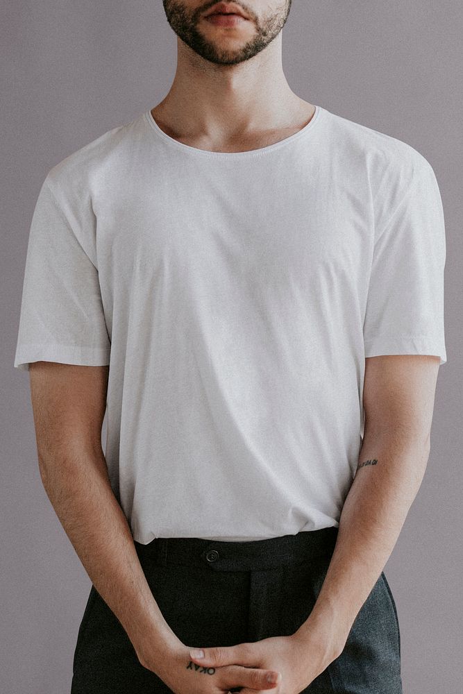 Bearded man in a white tee