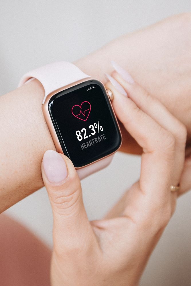 Woman wearing a smartwatch to check her heart rate