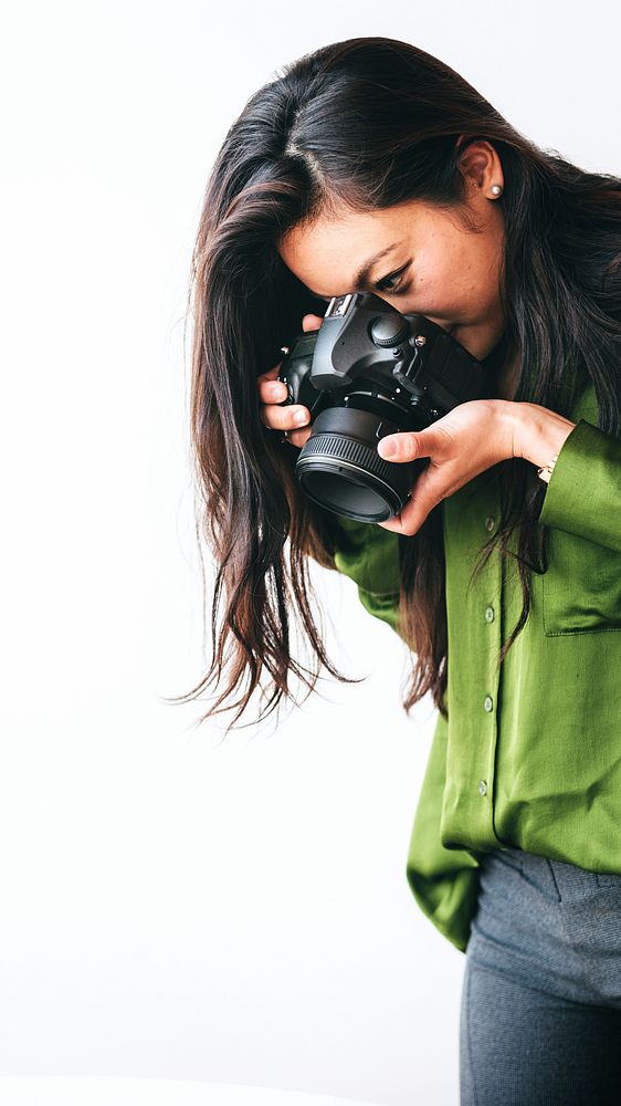 Female photographer shooting in a studio