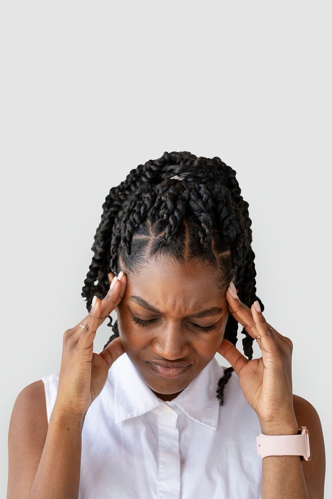 Stressed woman touching her head