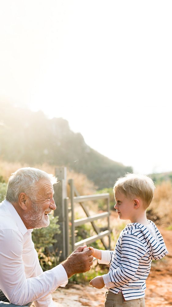 Granddad and grandson at a countryside farm design space 