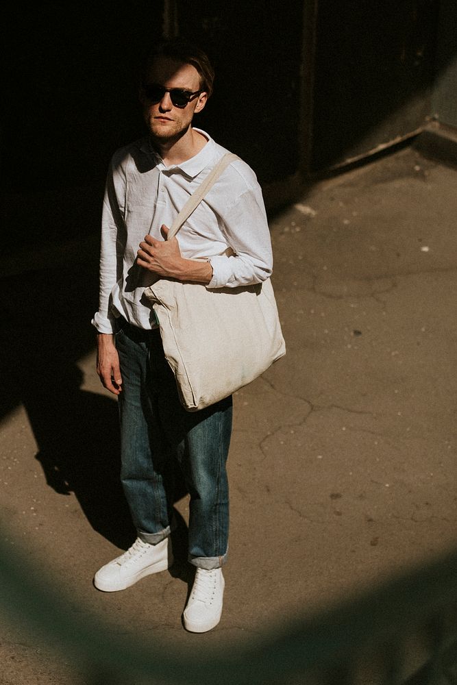 Casual man with eco tote bag