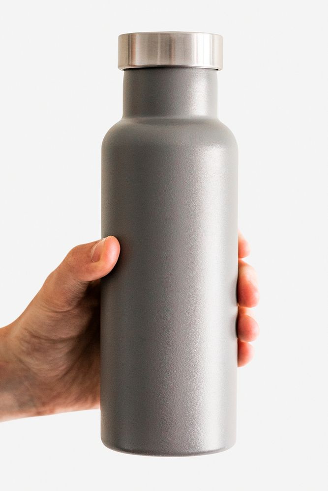 Hand holding gray water bottle mockup