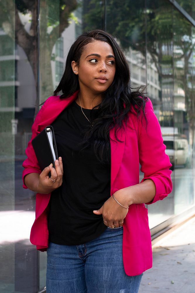 African American oman in pink blazer stylish business casual look 