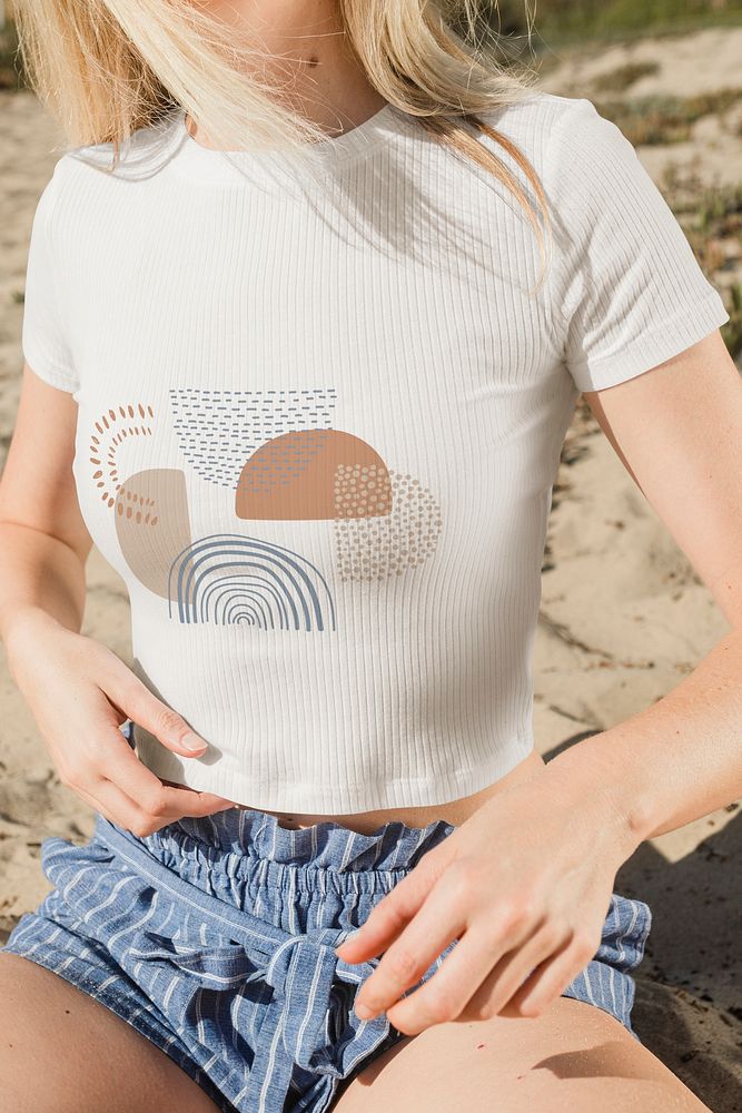 Woman in summer theme screened t-shirt at outdoor shoot