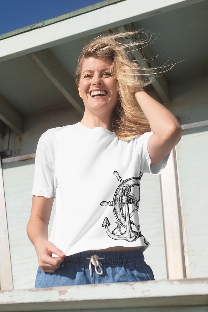 Woman in summer theme screened t-shirt at outdoor shoot