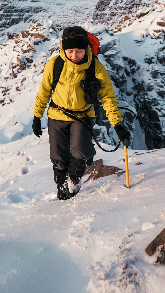 Mountaineer climbing Liathach Ridge, Scotland 