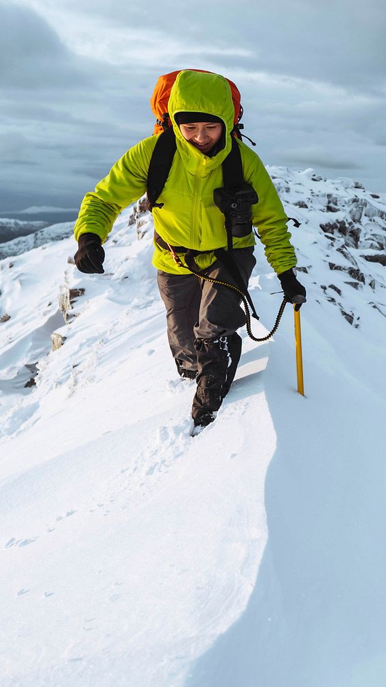 Mountaineer climbing Liathach Ridge, Scotland 