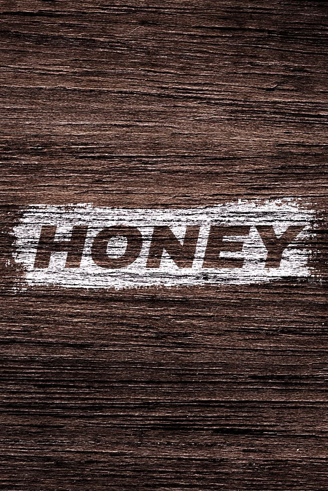 Honey word typography dark wood texture