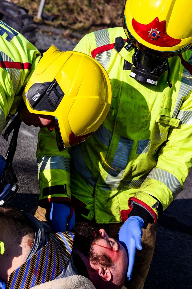 Firefighter rescuing patient, February 14, 2019, Cheshire, UK. Original public domain image from Flickr