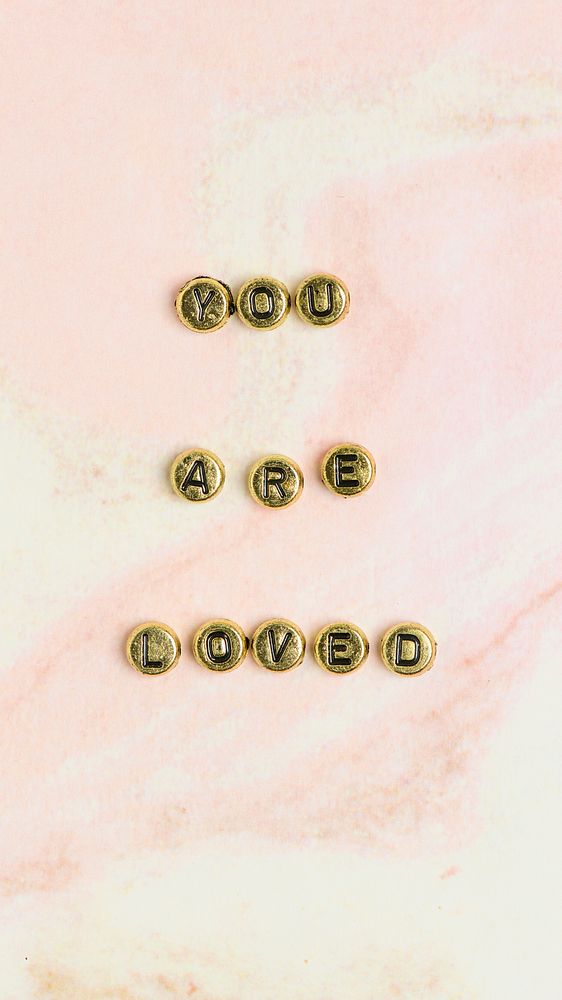 YOU ARE LOVED beads word typography