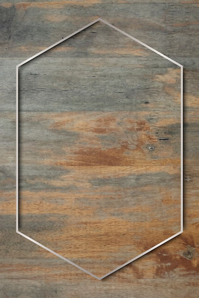Silver frame on grunge wooden background vector