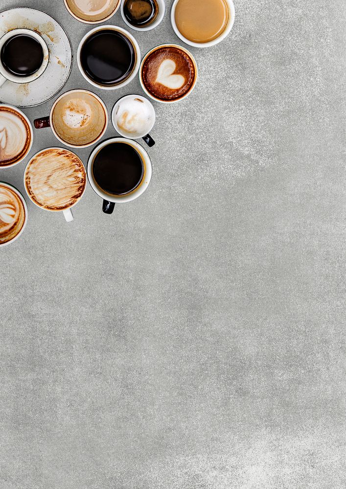 Various coffee cups on a gray textured wallpaper