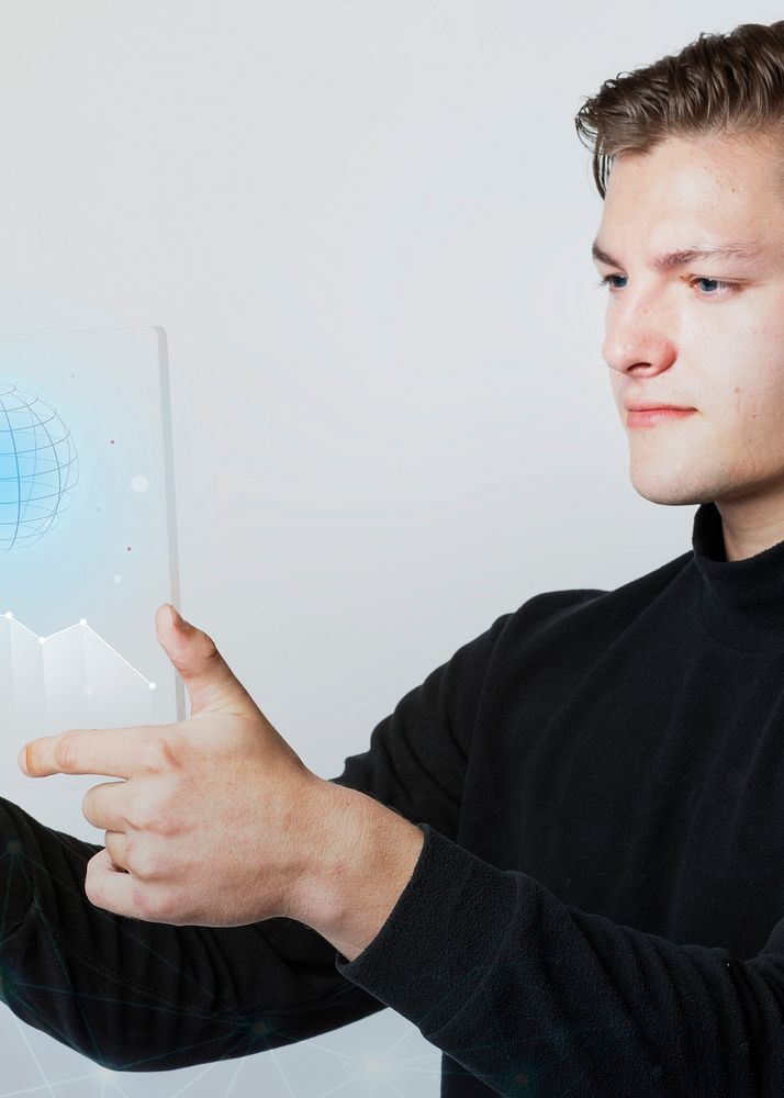 Businessman holding a digital screen