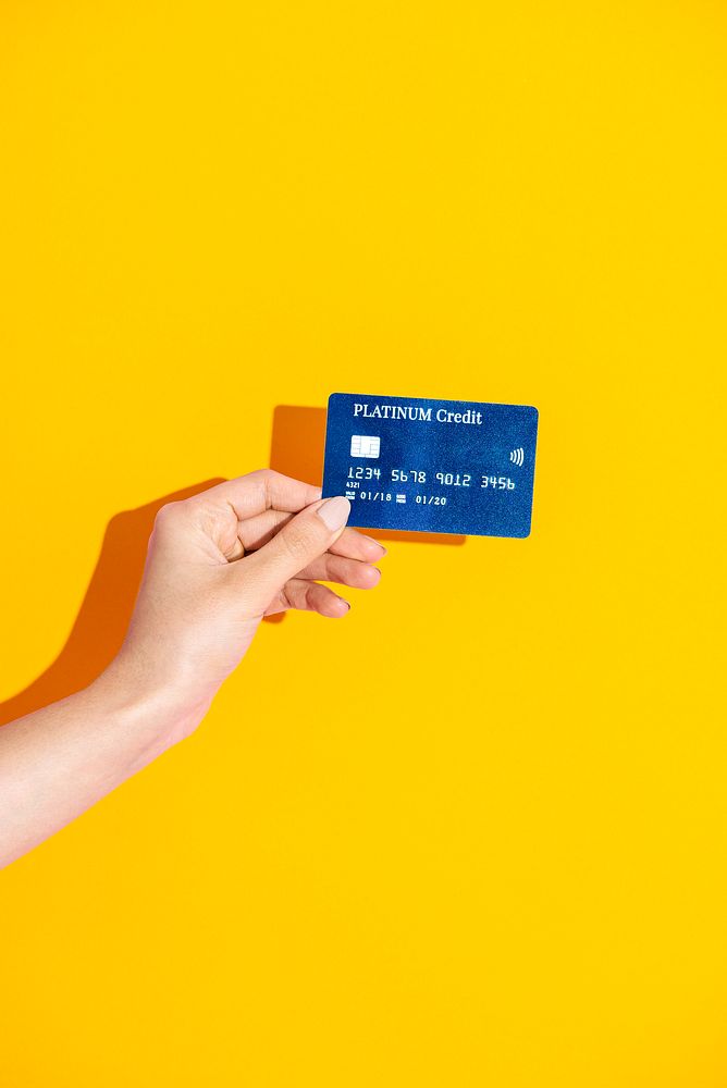Woman holding a credit card