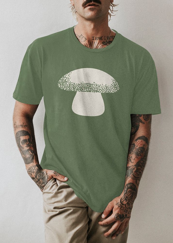 Tattooed man wearing green t-shirt