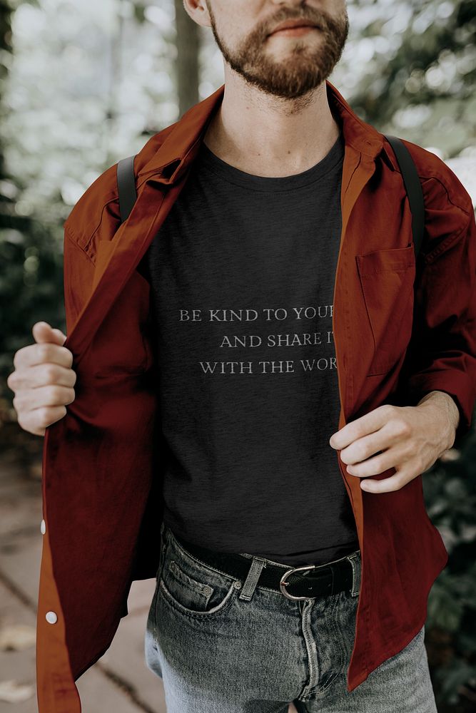 Man wearing black t-shirt, brown shirt